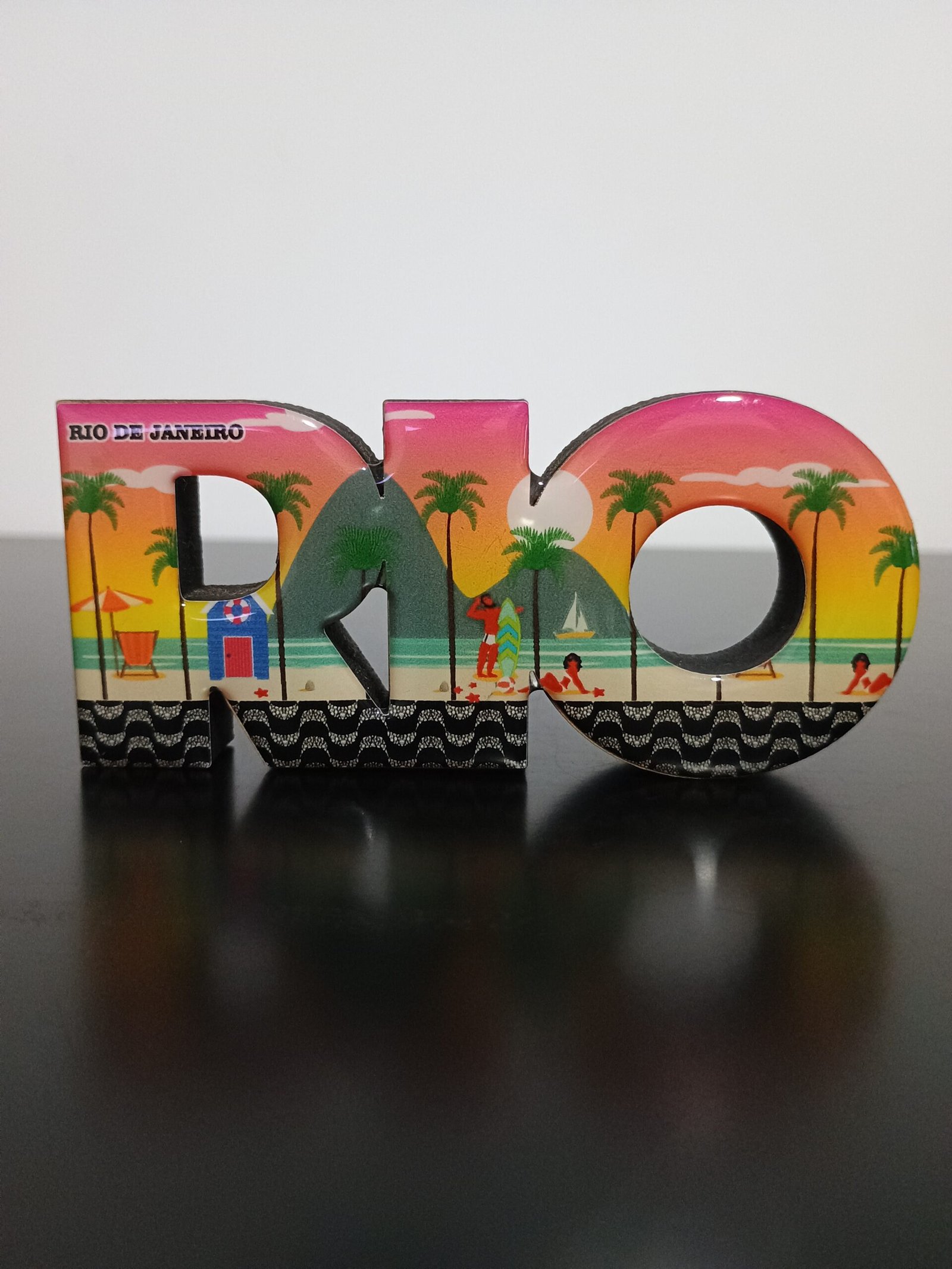 Placa decorativa escrito RIO