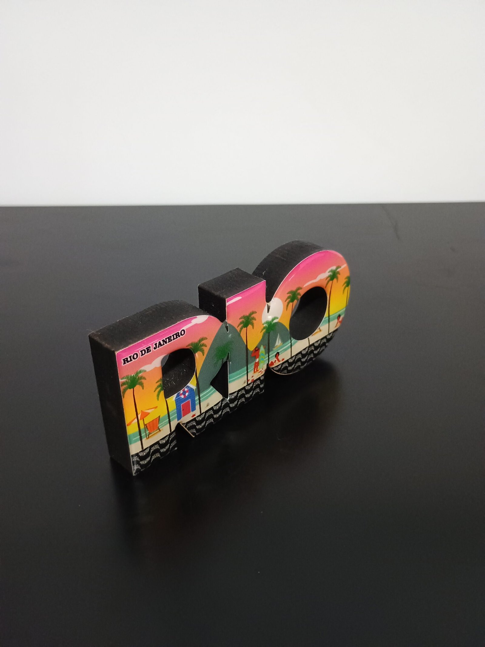 Placa decorativa escrito RIO